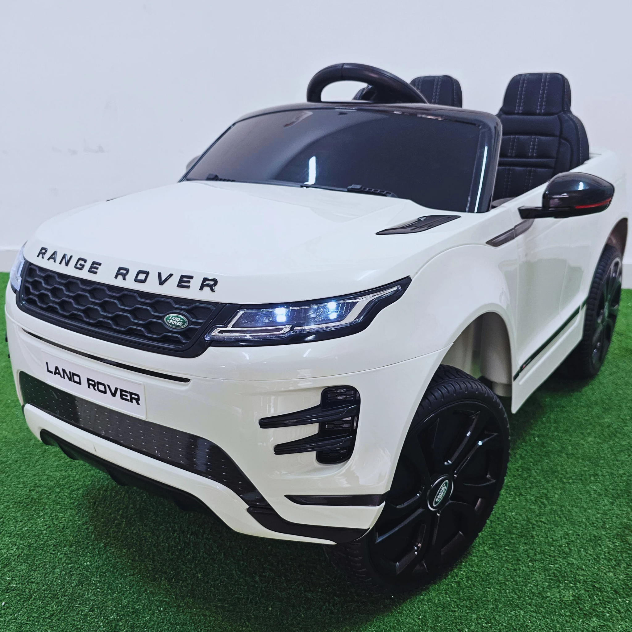 Coche Eléctrico para Niños RANGE ROVER EVOQUE 12v Blanco c/ RUEDAS DE GOMA & ASIENTO DE PIEL