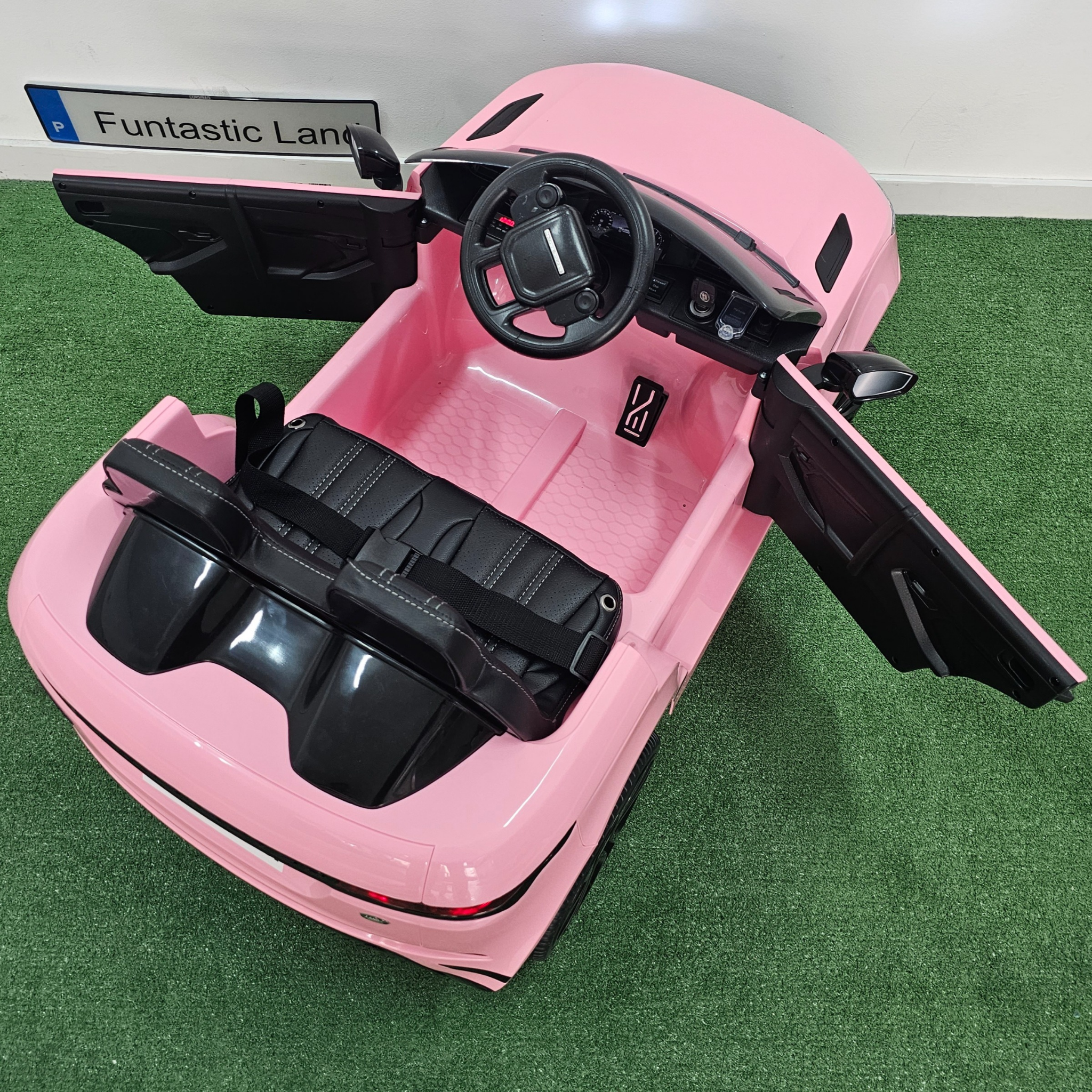 Coche Eléctrico para Niños RANGE ROVER EVOQUE 12v Rosa c/ RUEDAS DE GOMA & ASIENTO DE PIEL