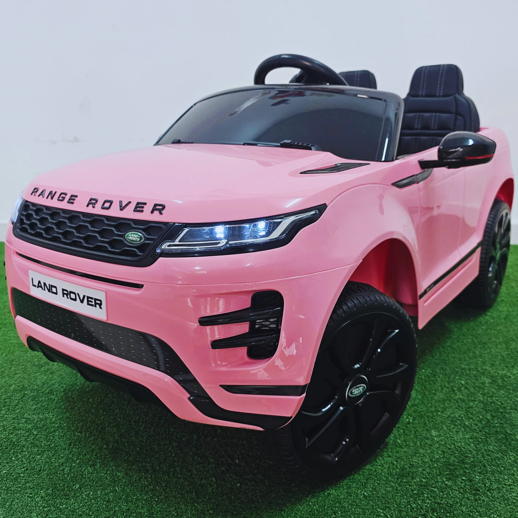 Coche Eléctrico para Niños RANGE ROVER EVOQUE 12v Rosa c/ RUEDAS DE GOMA & ASIENTO DE PIEL