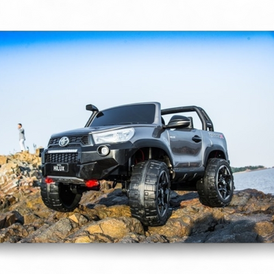 Coche Eléctrico para Niños TOYOTA HILUX Gris Metalizado 12v 4x4 c/ RUEDAS DE GOMA & ASIENTO DE PIEL