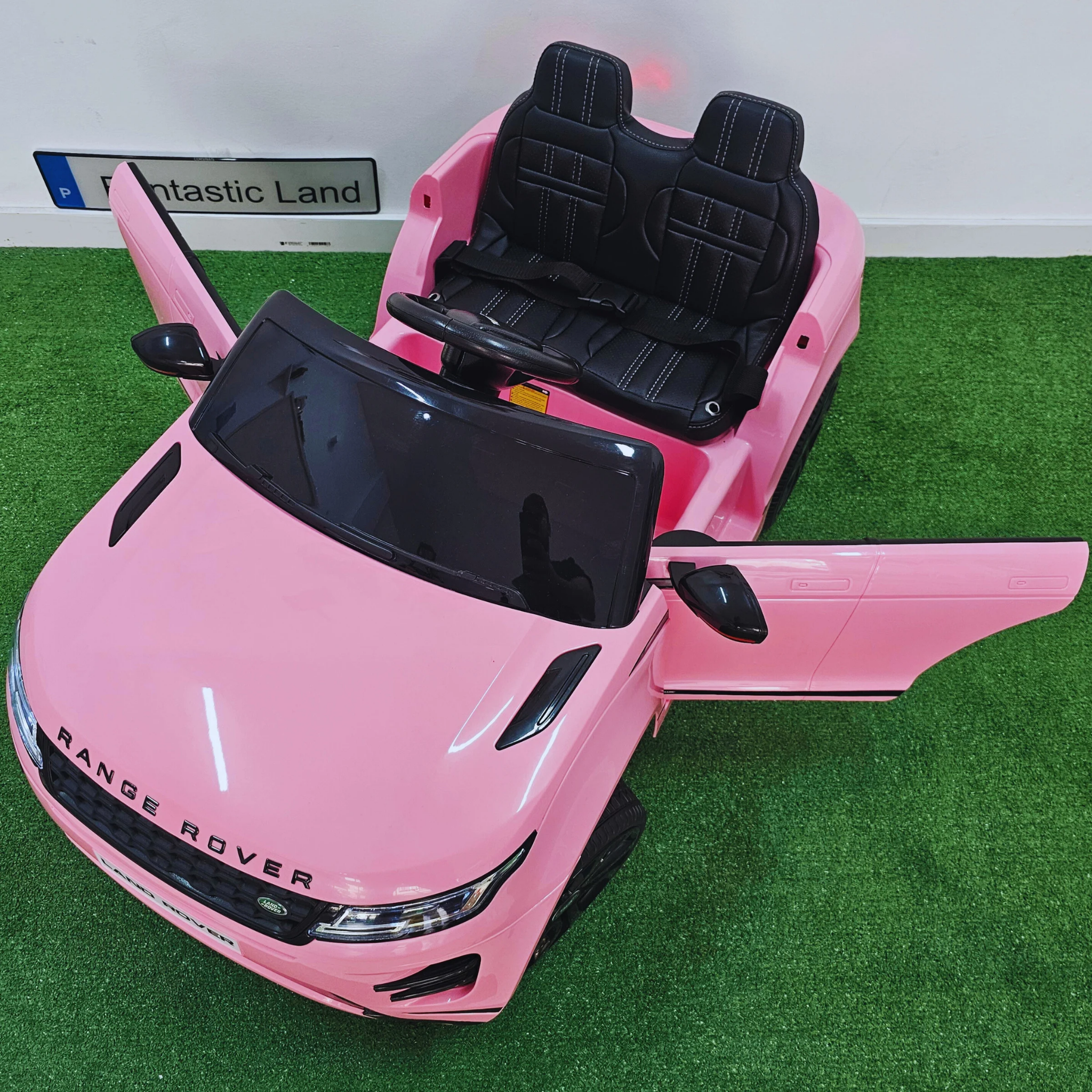 Coche Eléctrico para Niños RANGE ROVER EVOQUE 12v Rosa c/ RUEDAS DE GOMA & ASIENTO DE PIEL